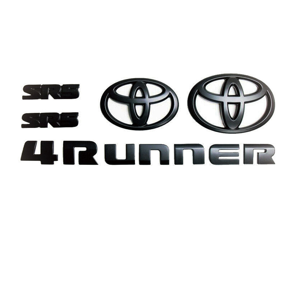 Black Toyota 4Runner emblem kit including two SR5 badges, two Toyota oval logos, and a set of '4Runner' letters.