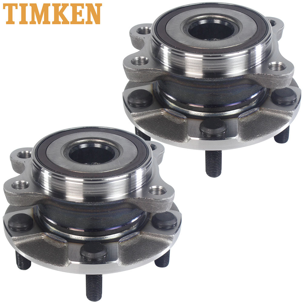 Two TIMKEN wheel hub assemblies with studs, displayed in front of an orange TIMKEN branded box, automotive replacement parts.