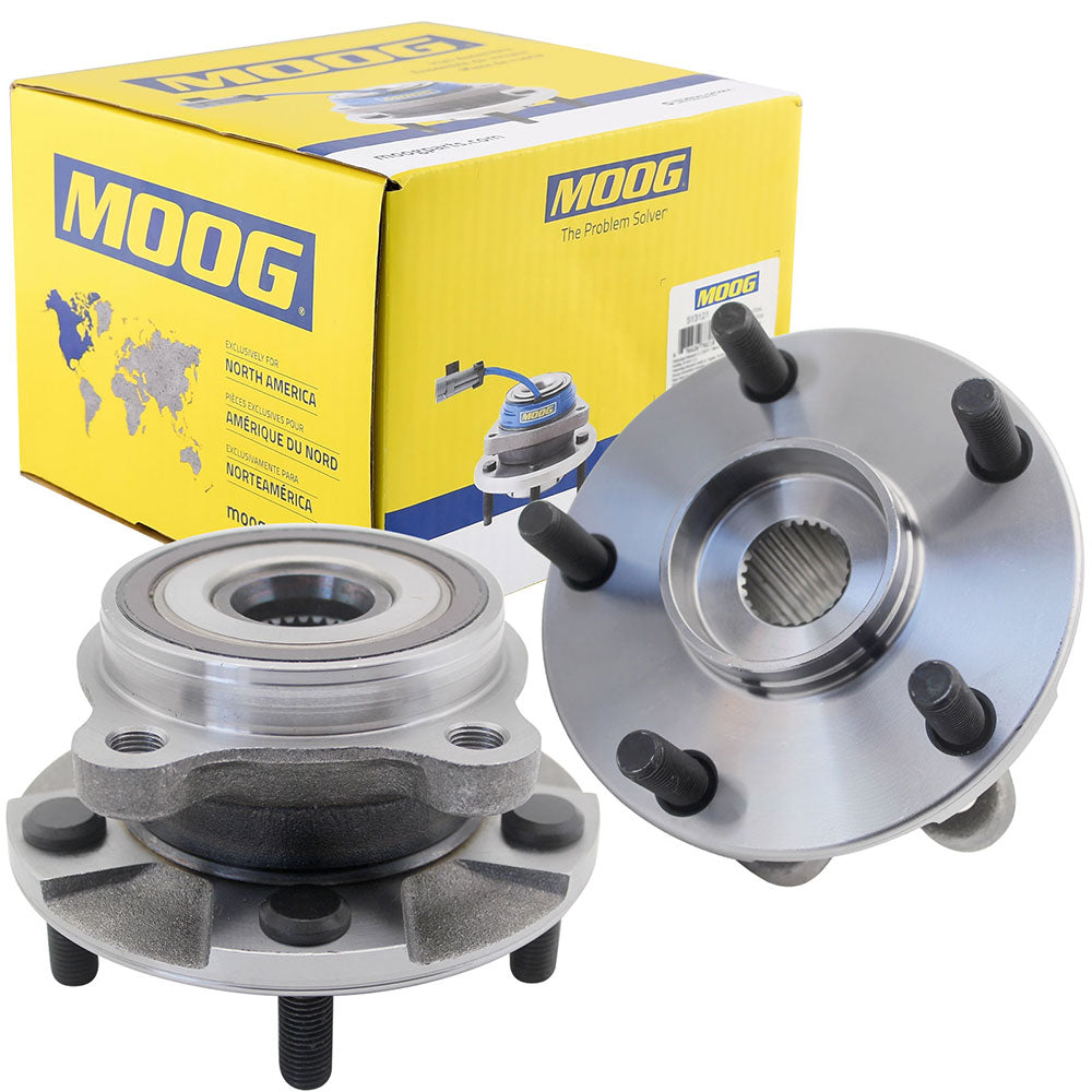Two MOOG wheel hub assemblies in front of a yellow MOOG branded box with world map, automotive replacement parts.

