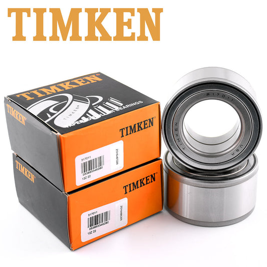 Two TIMKEN wheel bearings beside two orange and black TIMKEN boxes, with TIMKEN logo displayed above, automotive replacement bearings.


