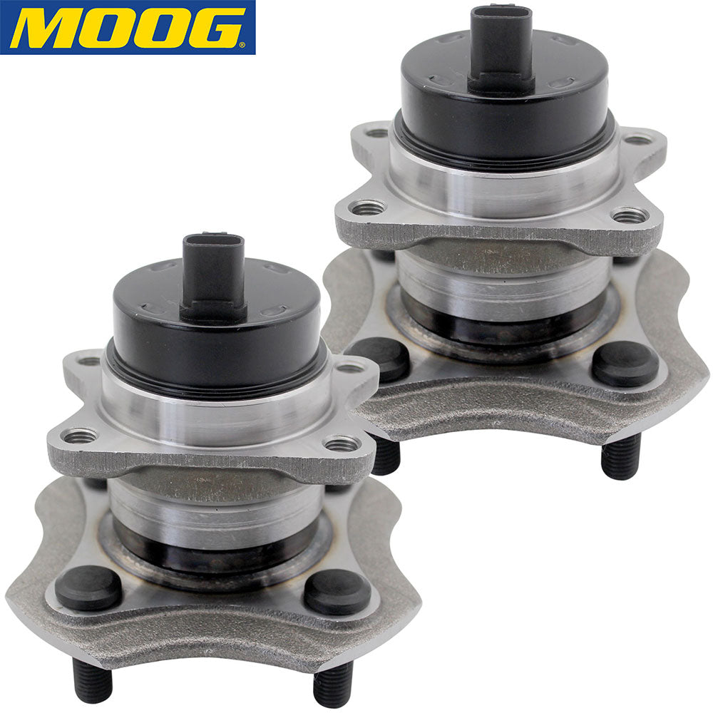 Two MOOG wheel hub assemblies with studs and ABS sensor, displayed in front of a yellow MOOG branded box, automotive replacement parts.

