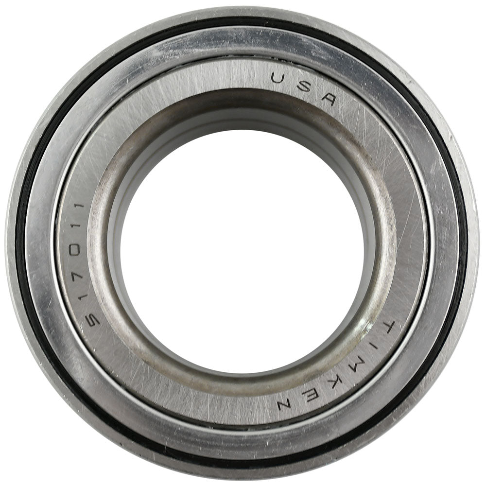 Two TIMKEN wheel bearings beside two orange and black TIMKEN boxes, with TIMKEN logo displayed above, automotive replacement bearings.

