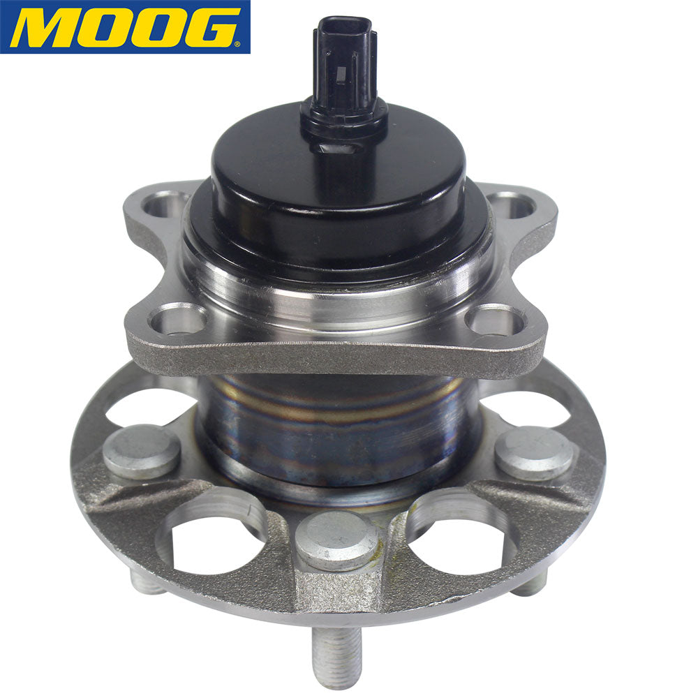 MOOG wheel hub assembly with sensor, front view, yellow branded box, automotive replacement part.

