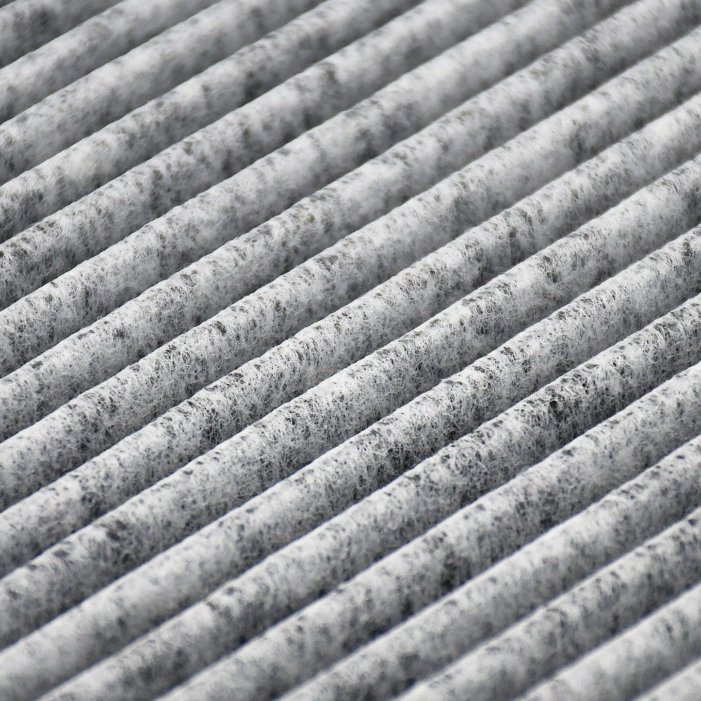 Cabin air filter C26176 with activated carbon pleated media, white frame labeled "MADE IN CHINA AIR FLOW" with directional arrow.

