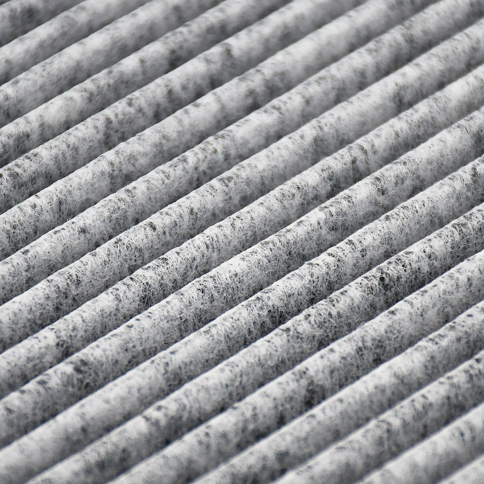 Cabin air filter C26176 with activated carbon pleated media, white frame labeled "MADE IN CHINA AIR FLOW" with directional arrow.

