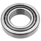 Close-up of L44610 tapered roller bearing outer race, showing metal surface and engraved part number. 